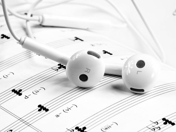 earphones and music sheet