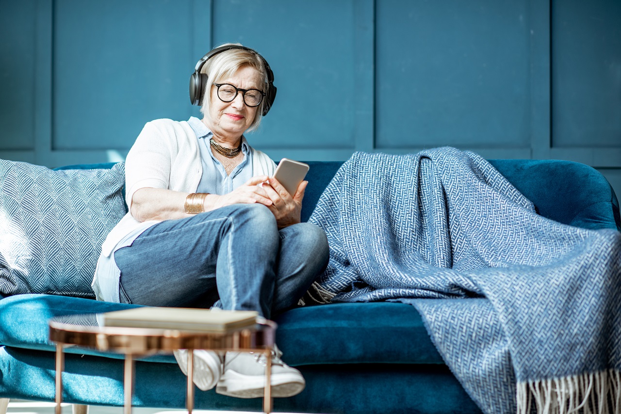 Senior woman listening to music