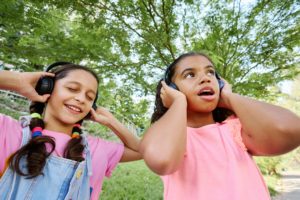 children listening to music