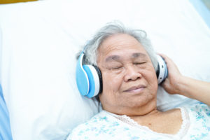 senior adult listening to music