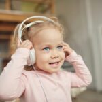 kid listening to music